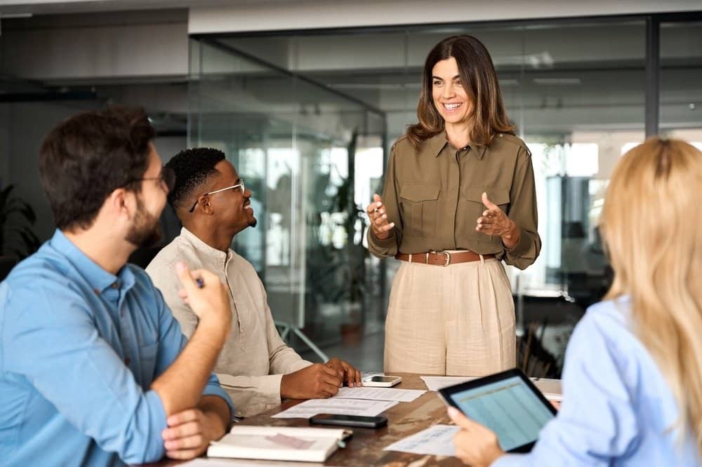 Happy,Middle,Aged,Business,Woman,Executive,Ceo,Leader,Discussing,Project