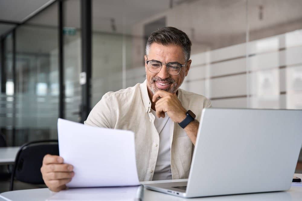 Smiling,Latin,Or,Indian,Male,Business,Man,Accountant,Analyst,Holding